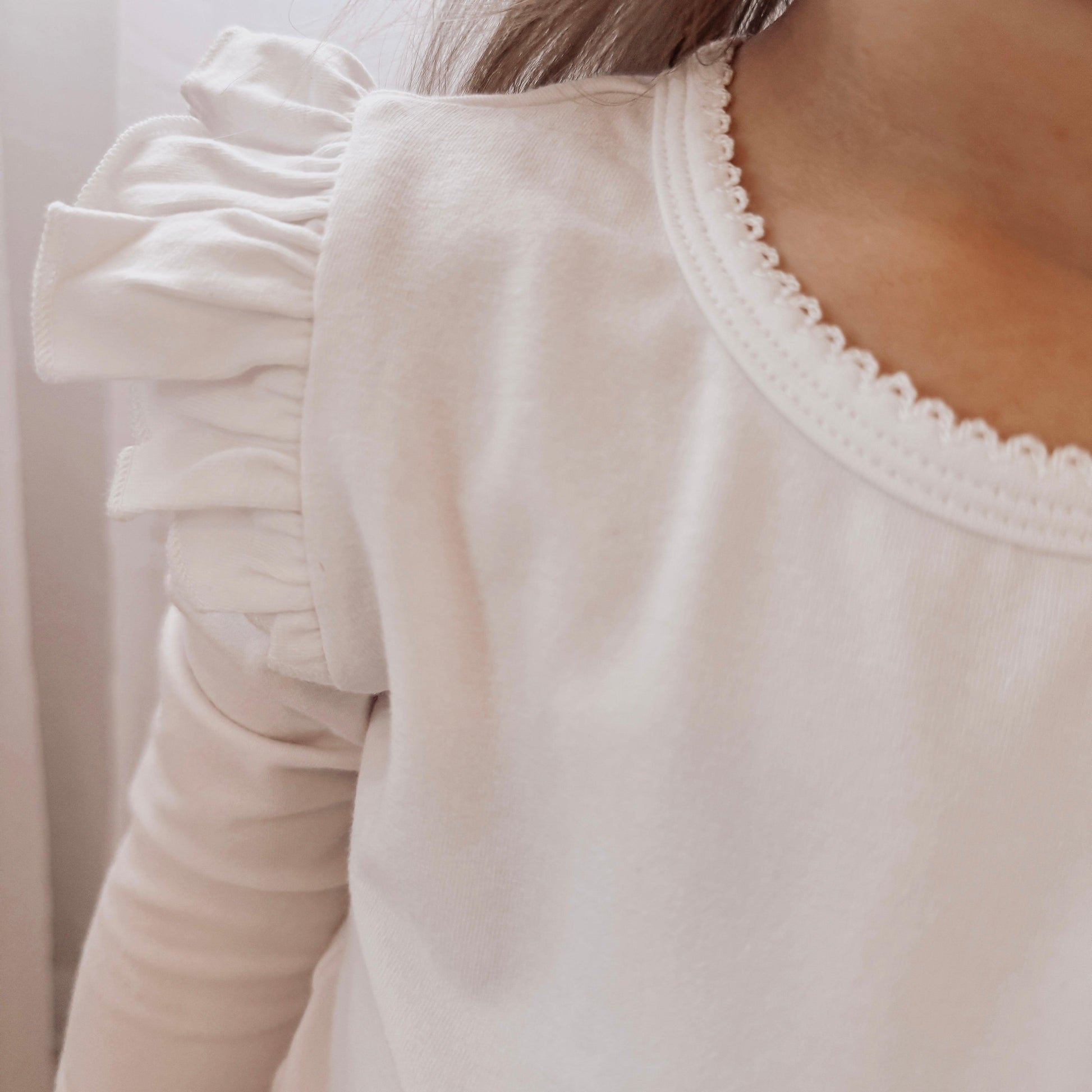 LONG SLEEVE FLUTTER TOP - ADORABLE WHITE - adorablethelabel