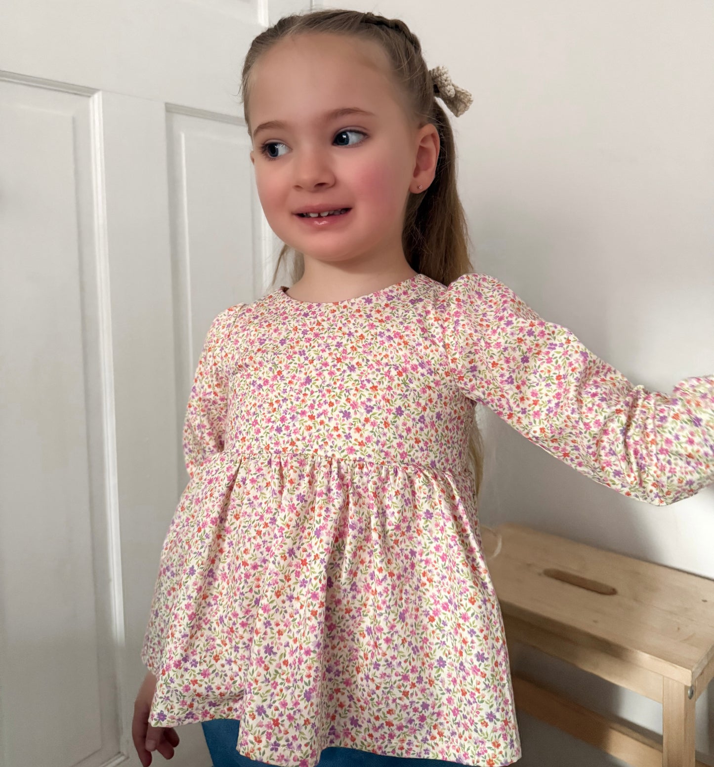 LONG SLEEVE PEPLUM TOP - ENCHANTED GARDEN