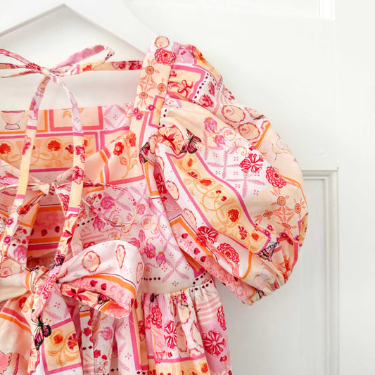 THE LITTLE VILLA ROSA BOW ROMPER