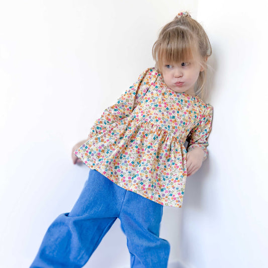 LONG SLEEVE PEPLUM TOP - WILD DAISY